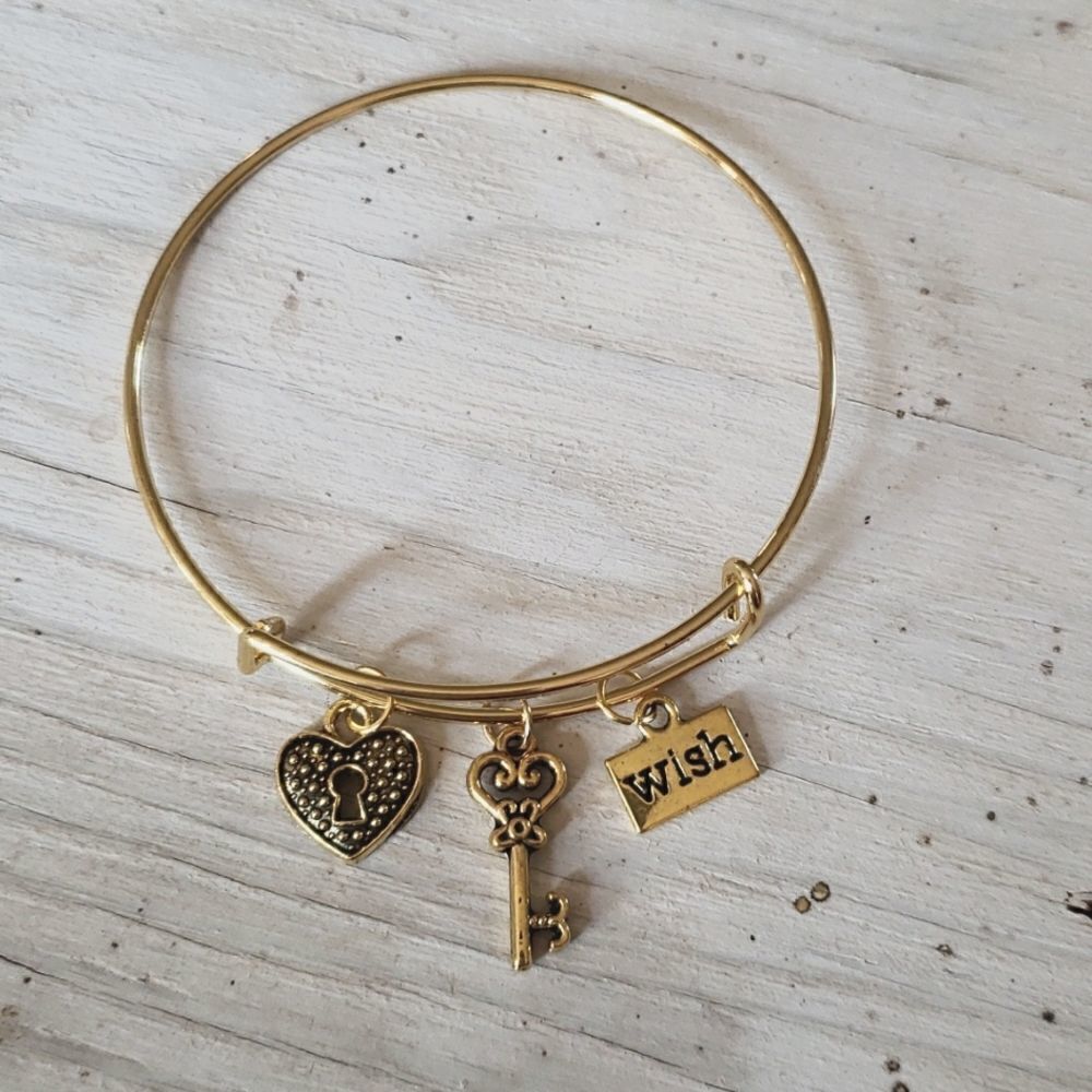 Bracelets by Sandra gold tone adjustable, wish
